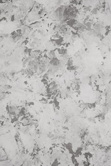 Textured gray background with imitation of concrete made of plaster.