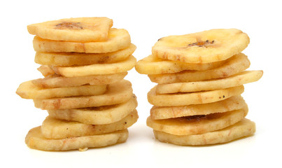 Banana chips on white background