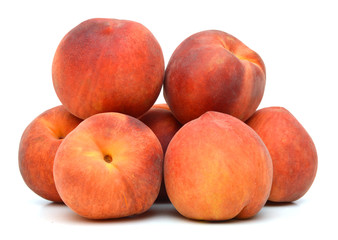  sweet peaches on a white background