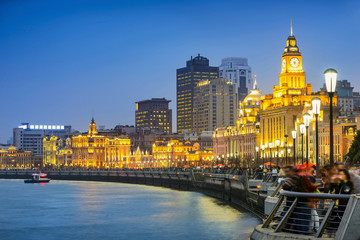 Shanghai at night. Located in The Bund (Waitan). It is a waterfront area in central Shanghai, one of the most famous tourist destinations in Shanghai, China.