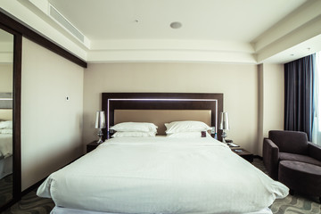 photo of interior design of luxury hotel bedroom