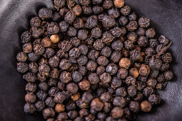 whole black peppercorn seasoning spice  background