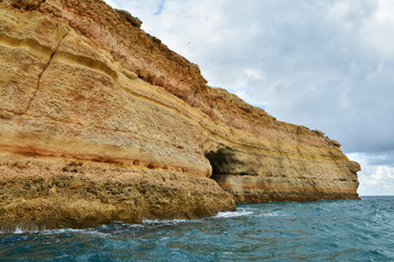 Fototapeta na wymiar Rocks formation on the Algarve coast near Benagil, Portugal, Europe. Nature geology seen from boat trip. 