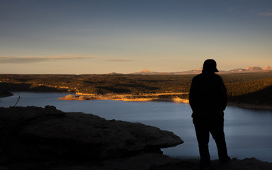 Fototapeta premium Contemplating sunset over the lake