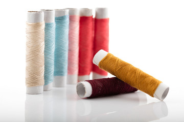 Sewing threads isolated on white background