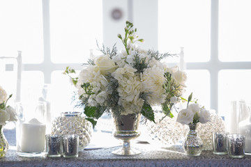 white rose centerpiece elegant lily of the valley