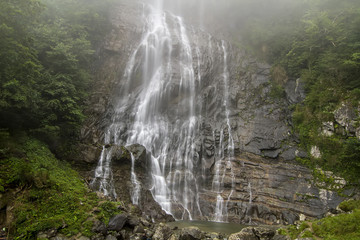 Fototapeta na wymiar Mencuna Waterfall is the most spectacular waterfalls of the eastern black sea - Artin Turkey