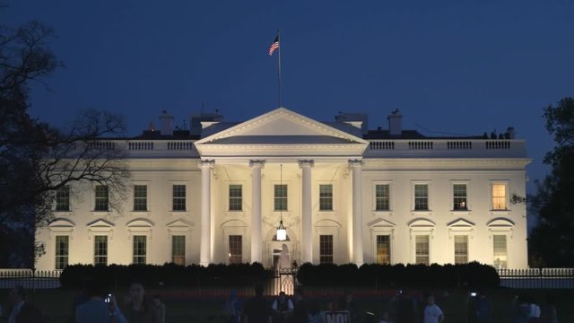 a dusk shot of the north side of the white house in washington d.c.