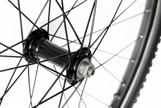 Detail of front bicycle wheel, hub and spokes of mountain bike