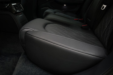 Modern car interior detail. Back passenger seats.