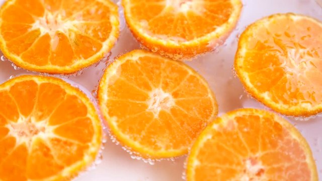 orange  slice in sparkling water