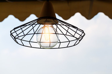 A grille chandelier lamp with neon lights.selective focus.