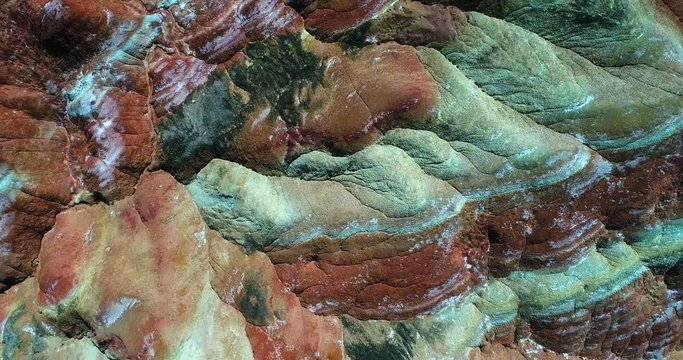 World&rsquo;s most amazing places. Aerial top down view on the colorful rainbow mountains of Zhangye danxia landform geological park in Gansu province. Part 1 of a 9 part series-can be merged to 1 continuou