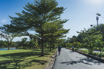 People runing in the SUANLUANG RAMA IX garden at the morning.