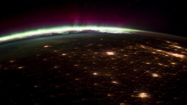 ISS view of rotating planet earth with aurora and star galaxy. Created from Public Domain images, courtesy of NASA JSC : http://eol.jsc.nasa.gov.