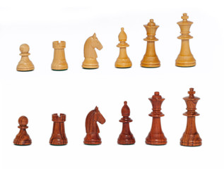 Wooden chess pieces. Chess, an ancient social game demanding to think.