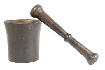 Old vintage mortar with pestle on white baackground