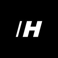 Initial letter IH, negative space logo, white on black background