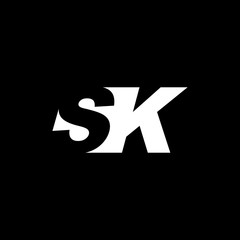 Initial letter SK, negative space logo, white on black background