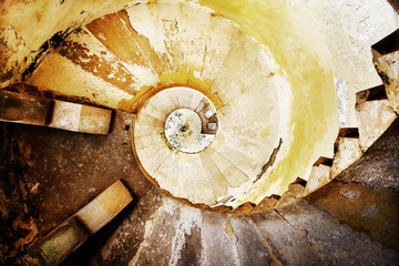 Abstract image of old spiral stone stairs