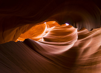 Eroded rock formations inside the Lower Antelope Canyon near Page, Arizona (USA). The sandstone slot canyon is a major tourist attraction.