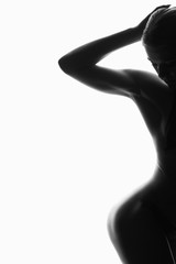 black and white portrait. female nude silhouette