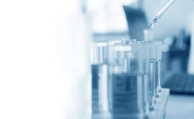 Researcher use science laboratory chemical test tube lab glassware equipment. Research and development concept.