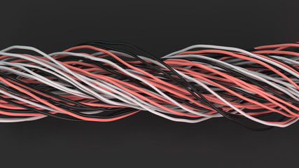 Twisted black, white and red cables and wires on black surface