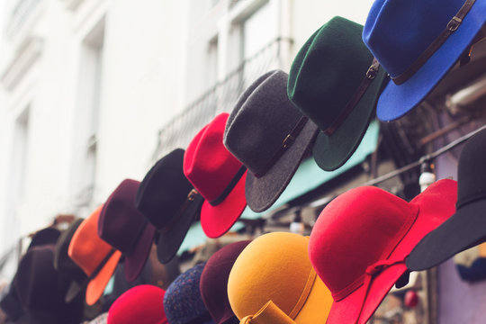 Stand With Colorful Hats On Store Entrance