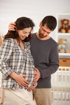 Portrait of pregnant couple expecting baby