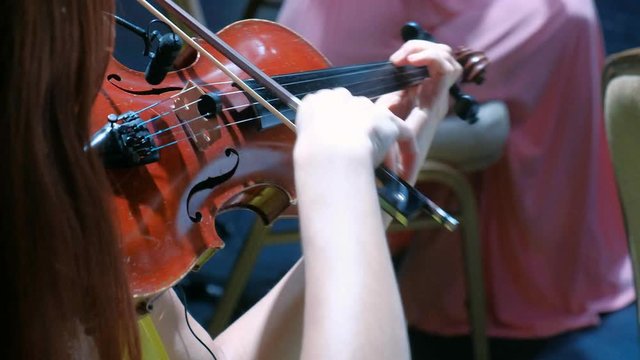 Close-up of musician playing violin, classic music