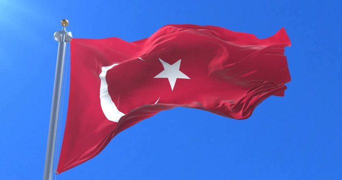 Turkey flag waving at wind in slow in blue sky, loop