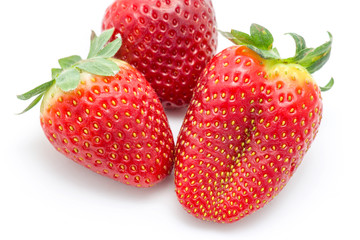 ripe strawberries isolated on white