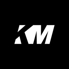 Initial letter KM, negative space logo, white on black background