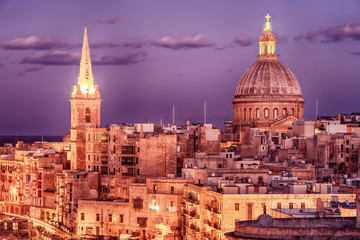 Fototapeta na wymiar Valletta, Malta: aerial view from city walls at night. The cathedral