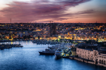 Malta: Manoel Island, Il-Gzira and Marsans Harbour. Aerial view from city walls of Valletta at sunset