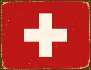 Vintage Metal Sign - Switzerland Flag - Vector EPS10. Grunge scratches and stain effects can be easily removed for a cleaner look.