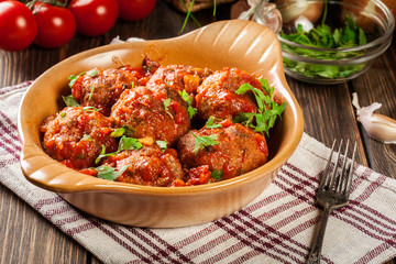 Pork meatballs with spicy tomato sauce in dish