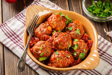 Pork meatballs with spicy tomato sauce in dish