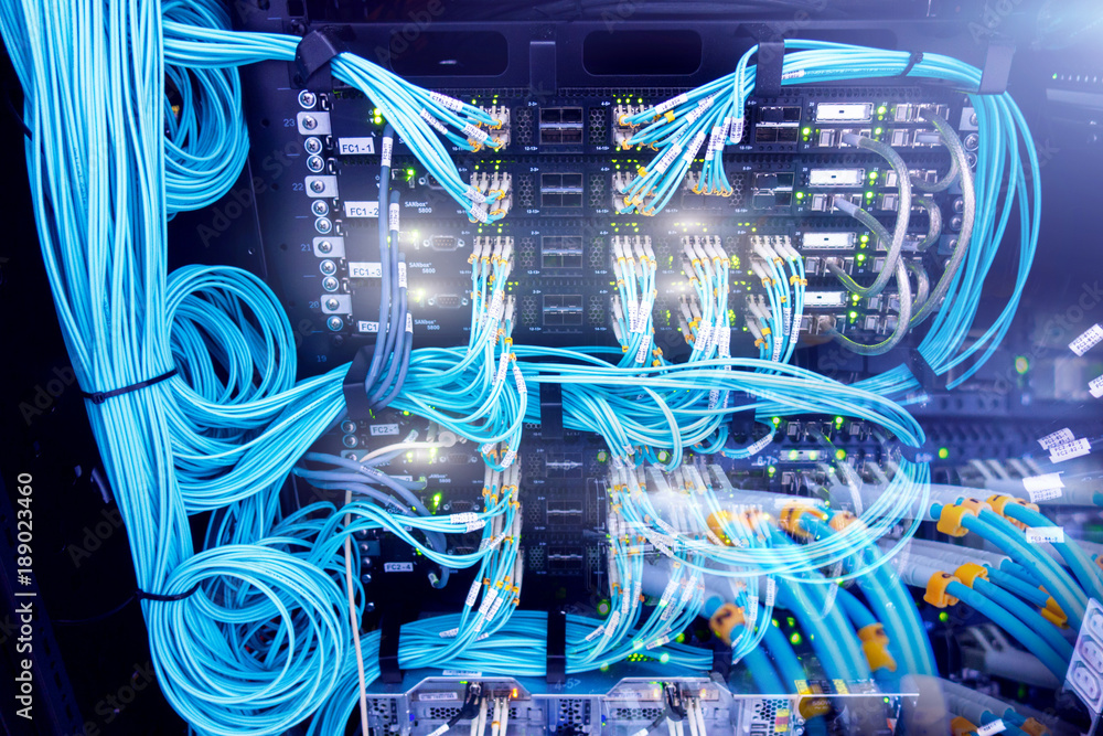 Poster fibre channel swich. fibre channel swich. server rack audio cable. severs computer in a rack at the 
