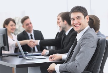 lawyer on the background of business partners handshaking