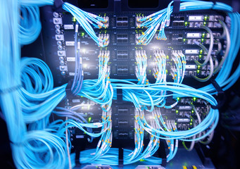 Fibre Channel swich. Fibre Channel swich. Server rack audio cable. Severs computer in a rack at the...