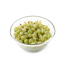Gooseberries in a glass bowl isolated