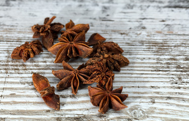 star anise seeds on wooden table