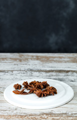 dry star anise on a plate