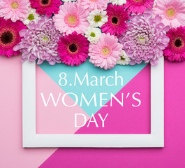 Happy Women's Day Pastel Candy Coloured Background. Floral womens day flat lay minimal geometric patterns greeting card.