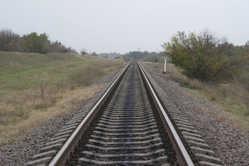 Fototapeta na wymiar An alternative way of moving. A journey into the past. Railway track.