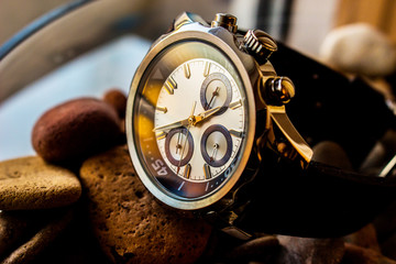 Fototapeta premium Luxury wrist man watch with leather strap showing time