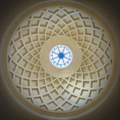 Circular interior of an ancient church concrete dome with natural light