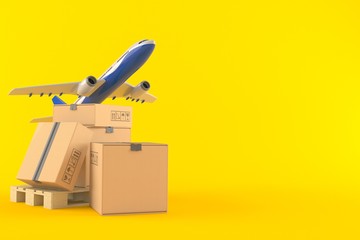 Packages on palette with airplane